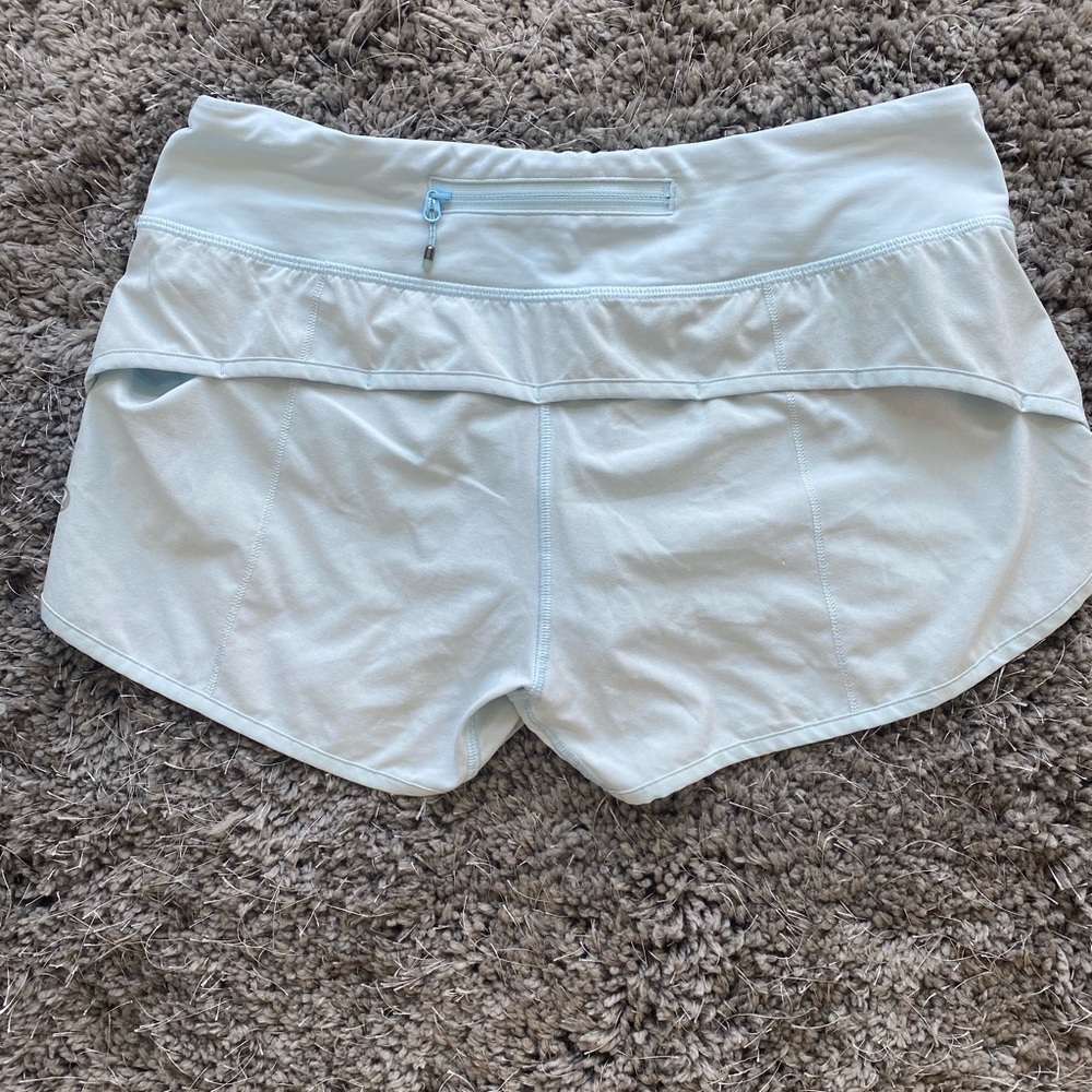 Lululemon Speed Up Mid-Rise Short 4”. Blue. Size 6